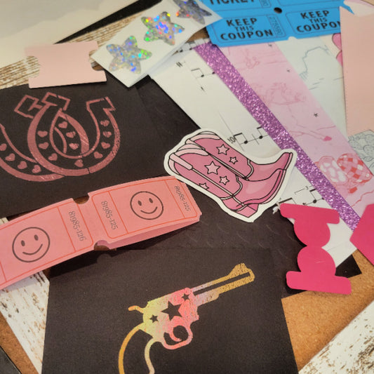 Disco Cowgirl ephemera kit with pink western papers, smiley tickets, cowboy boot sticker, foil horseshoe and revolver cards