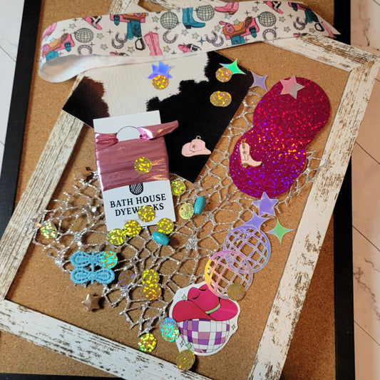 Disco Cowgirl mixed media embellishments with cow-print fabric, metallic pink ribbon, holographic sequins, turquoise beads, charms and silver glitter net