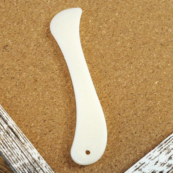 Smooth plastic paper creaser and bone folder alternative for folding and burnishing paper